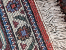 Load image into Gallery viewer, Large Vintage Hand-Knotted Wool Rug – Geometric Medallion & Floral Border – 7'1" × 5'