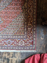 Load image into Gallery viewer, Large Vintage Hand-Knotted Wool Rug – Geometric Medallion & Floral Border – 7'1" × 5'