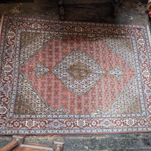 Load image into Gallery viewer, Large Vintage Hand-Knotted Wool Rug – Geometric Medallion & Floral Border – 7'1" × 5'
