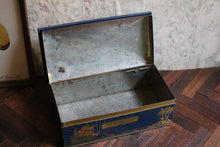 Load image into Gallery viewer, Huntley & Palmers “Captain Cook Arrives at Tahiti” Biscuit Tin – Nautical Scene – 20 × 7 × 10 cm