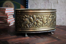Load image into Gallery viewer, Oval Repoussé Brass Cachepot On Paw Feet – Fruit & Foliage Relief, c. Late 19th–Early 20th Century