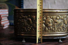 Load image into Gallery viewer, Oval Repoussé Brass Cachepot On Paw Feet – Fruit & Foliage Relief, c. Late 19th–Early 20th Century
