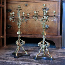 Load image into Gallery viewer, Pair Of Tall Antique  Five-Light Gilt Brass Candelabra On Ebonised Tripod Bases — Ram-Head & Foliate Scrollwork — 51.5 cm (20.3 in)