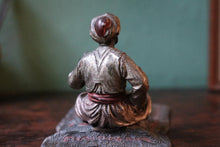 Load image into Gallery viewer, Cold-Painted Spelter Bergman Style Figure – Turbaned Pipe Smoker on Carpet Tray