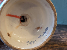 Load image into Gallery viewer, An Islamic Tin Glazed Earthenware Candlestick
