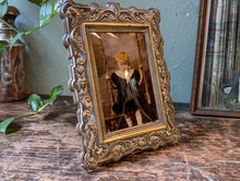 Load image into Gallery viewer, Victorian Crystoleum Photograph In Ornate Brass Easel Frame
