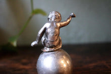 Load image into Gallery viewer, Vintage Boy Sitting on Egg Figurine Casting
