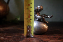 Load image into Gallery viewer, Vintage Boy Sitting on Egg Figurine Casting
