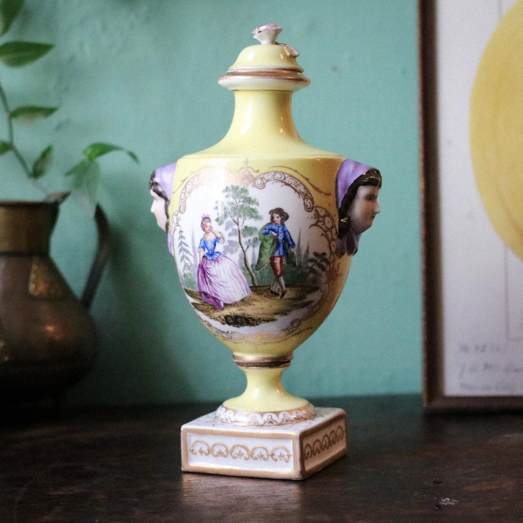 Hand-Painted 19th.C Porcelain Dresden Urn Vase with Figural Mask Handles