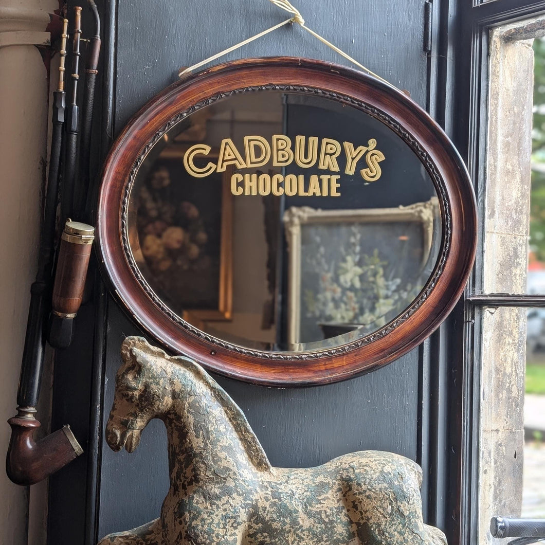 Antique Cadbury’s Chocolate Reverse-Glass Advertising Mirror, Oval Frame, 59 x 51cm