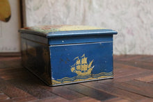 Load image into Gallery viewer, Huntley &amp; Palmers “Captain Cook Arrives at Tahiti” Biscuit Tin – Nautical Scene – 20 × 7 × 10 cm

