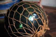 Load image into Gallery viewer, Antique British Glass Fishing Float with Net — “FGC” Maker’s Mark (Forsters Glass Co.), c. 1920–40
