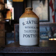 Load image into Gallery viewer, 26cm Stoneware Ginger Beer / Botanical Brewer Bottle — R. Ratcliffe, Thurston Road, Pontypridd, Two-Tone Advertising, c.1890–1910
