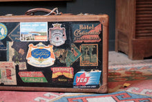 Load image into Gallery viewer, Vintage Stickered Travel Suitcase – Swedish American Line, Trans-Canada Air Lines &amp; Hotel Labels – 1930s–50s – 55 × 16 × 34 cm
