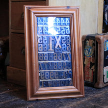 Load image into Gallery viewer, Framed Antique Printers’ Woodblock Type – Letterpress Blocks Under Glass, 32.5 × 52.5 cm
