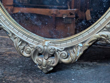 Load image into Gallery viewer, Vintage Gilt Oval Wall Mirror With Ornate Rococo Style Frame And Foxed Glass, 72 x 45cm
