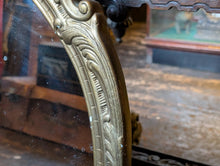 Load image into Gallery viewer, Vintage Gilt Oval Wall Mirror With Ornate Rococo Style Frame And Foxed Glass, 72 x 45cm
