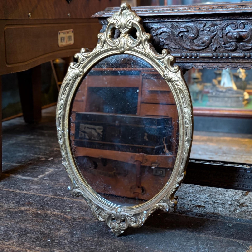 Vintage Gilt Oval Wall Mirror With Ornate Rococo Style Frame And Foxed Glass, 72 x 45cm