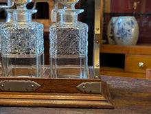 Load image into Gallery viewer, Antique Victorian Oak And Brass Tantalus With Three Cut-Glass Decanters, Working Lock Key - 35 x 33 cm
