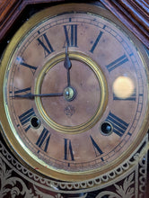 Load image into Gallery viewer, Antique Ansonia Carved Wood Mantel Clock With Brass Pendulum &amp; Ornate Glass Door, Roman Dial, Working – 57cm
