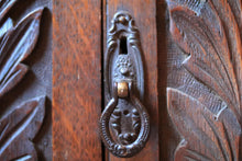 Load image into Gallery viewer, Antique Arts and Crafts Carved Oak Smoker’s / Pipe Cabinet C.1910
