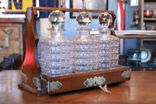 Load image into Gallery viewer, Antique Edwardian Wooden Tantalus Decanter Set – Cut Glass Bottles With Key
