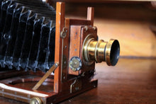 Load image into Gallery viewer, Antique Mahogany Field Camera With Brass Lens – Large Format Bellows Camera
