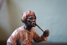 Load image into Gallery viewer, Cold-Painted Spelter Bergman Style Figure – Turbaned Pipe Smoker on Carpet Tray
