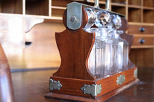Load image into Gallery viewer, Antique Mahogany 3 Bottle Tantalus - Cut Glass Decanters - Silver Plated Fittings
